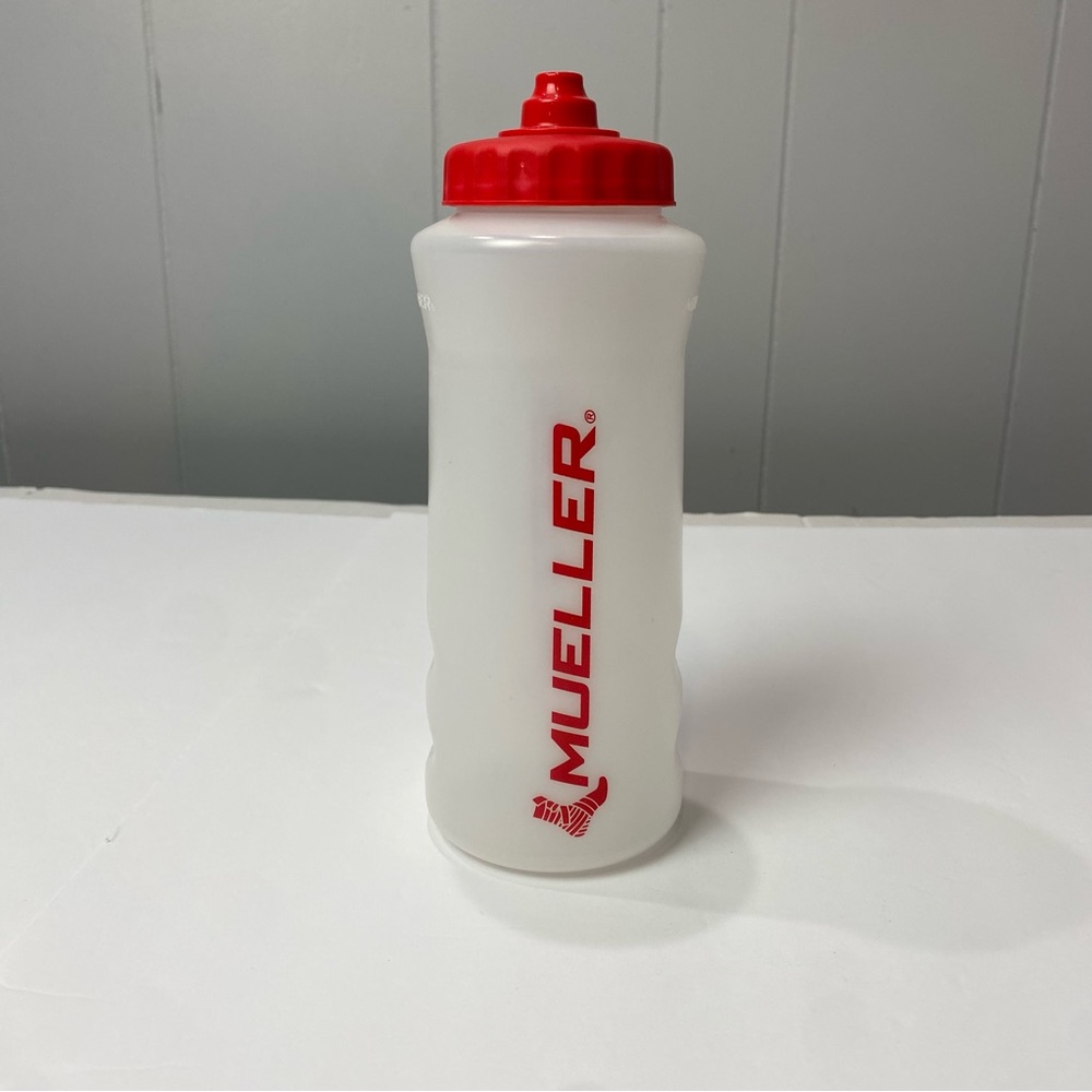 Mueller squeeze water bottle translucent with red lid and logo 32 ounce